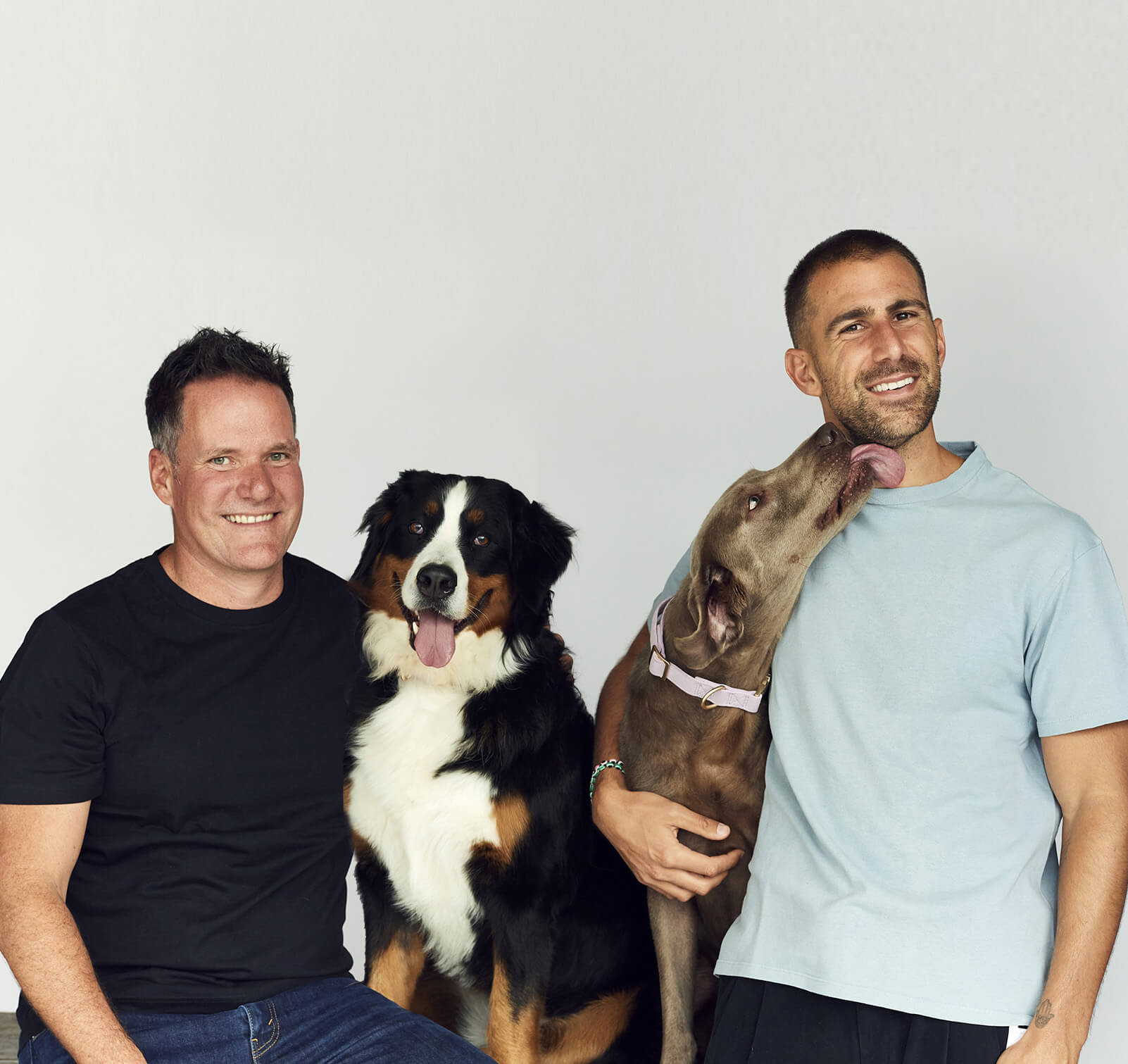 Picture showing Dan and Russ with their dogs.
